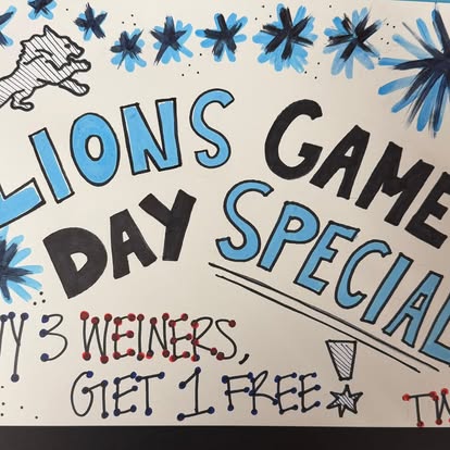 Hand-drawn sign: Lions game day special, buy 3 weiners, get 1 free